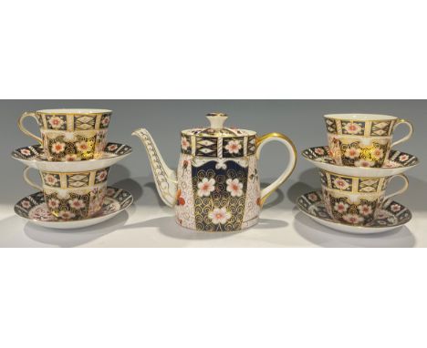 A Royal Crown Derby Imari 2451 pattern teapot, 16.5cm, second quality; a set of four 2451 pattern breakfast cups and saucers,