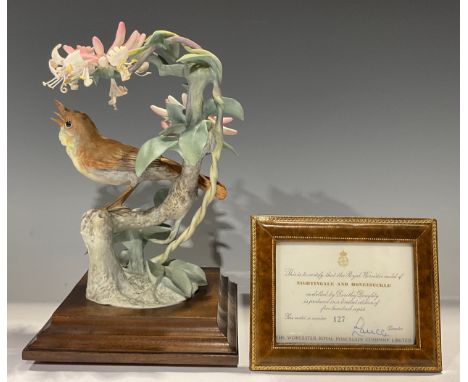 A Royal Worcester bird model, Nightingale and Honeysuckle, modelled by Dorothy Doughty, limited edition 127/500, wooden plint