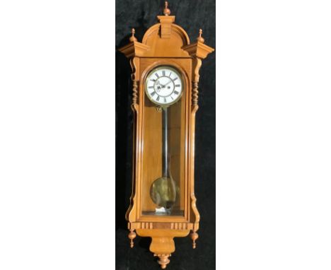 A late 19th/early 20th century walnut Vienna wall clock, 125cm high 
