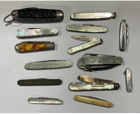 A collection of pocket pen and fruit knives, including silver and mother of pearl, advertising, Girl Guides, multi-tool, etc 