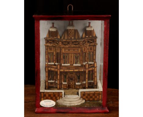 An early 19th century Napoleonic prisoner of war straw work model, in the form of a facade of a house with windows, balconies