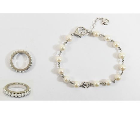 Emporio Armani Silver Ring and Silver Bracelet. Silver tone and faux pearl ring along with faux pearl station bracelet with b