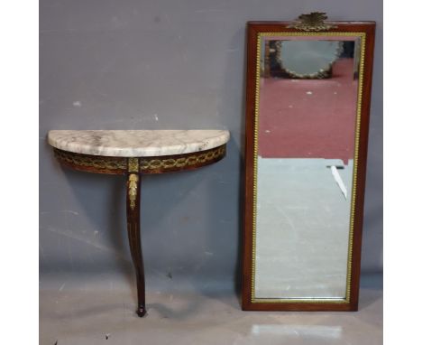 A 20th century French mahogany rectangular mirror with bevelled glass plate and floral finial, 84 x 32cm, together with a mar
