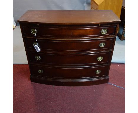 A Regency style mahogany bow fronted chest of four drawers, with brush slide, H.92 W.112 D.51cm 