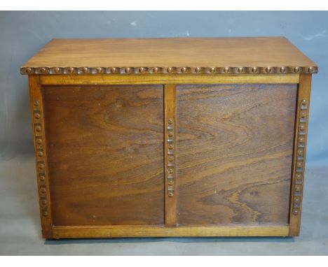 A trunk with hinged lid, H.55 W.80 D.45cm 