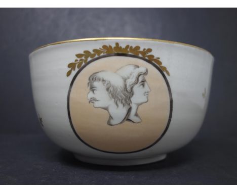 An early 19th century porcelain Bristol-ware slop bowl, with unusual portrait motifs design and gilt leaves, H.9cm Diameter 1