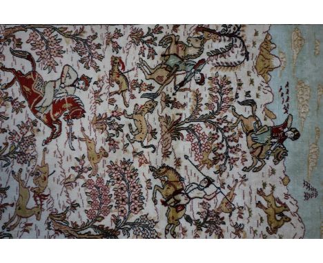 A small Persian pure silk Rug with hunting scenes, 64 x 47cm 