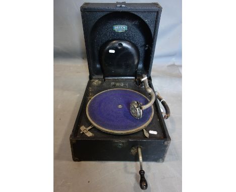 A Decca Model 66 portable record player with winding handle, H.21 W.30 D.39cm 