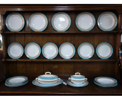 A Royal Worcester part dinner service, with turquoise rim and gilt floral border, marked to bases, comprising 10 plates, 6 si