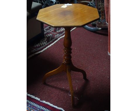 A Victorian walnut tripod wine table, with octagonal top on turned support and tripod feet, H.73 W.46 D.46cm 