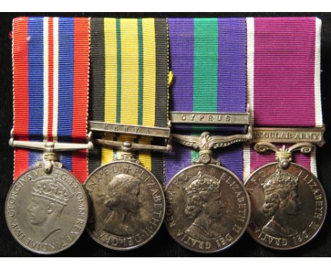 Group mounted as worn - War Medal, Africa General Service Medal QE2 with Kenya clasp (14568821 Sgt J E Flannigan REME (tiny c