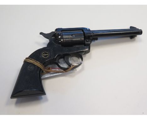Revolver: A 6 shot .38 cal copy of the Colt Single Action Army. Sidegate loading. Working order and good condition. With cert