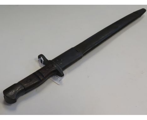 Bayonet: A Home Guard P.13 bayonet made by Remington in September 1917 & with U.S. markings in its steel mounted leather scab