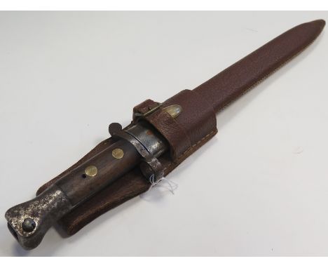 Bayonet: A P1888 bayonet dated Jan 1897 & WD marked in its well hand made leather scabbard with frog. Very unusual. 