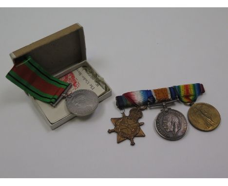 1915 Star Defence Medal to 15815 Pte W Hollyoak S.Staff R. of Willenhall, Staffs. Plus BWM to 42310 Pte J Perry W.York R, and