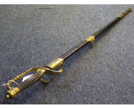 Sword: A modern copy of an 1800 Naval Officers 5 ball spadroon in its brass mounted leather scabbard. Blade 31" ricasso marke