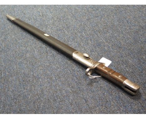Bayonet: A P13 bayonet dated May 1917 by Remington. In its steel mounted leather scabbard. Clean condition. 