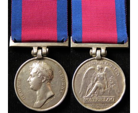 Waterloo Medal 1815 correctly named to 'Joseph Froggard 11th Reg. Light Dragoons'. Contemporary replacement suspender. (Stren