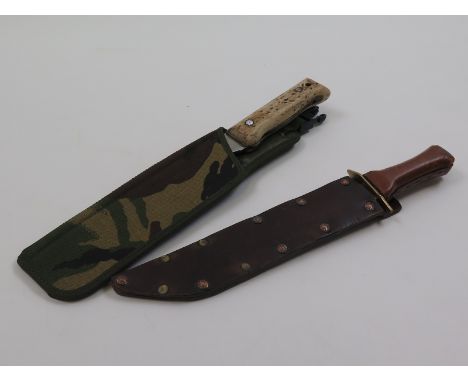 British Army Jungle machete, new condition. Plus modern Bowie Type knife. (2)