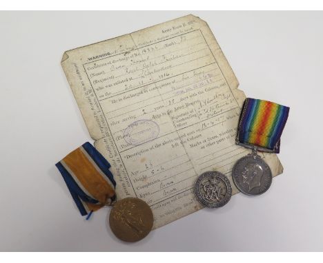 BWM & Victory Medal + Silver War Badge No 179297, to 18336 Pte O Thomas R.W.Fus. Badge confirmed to roll. (missing a 1915 Sta