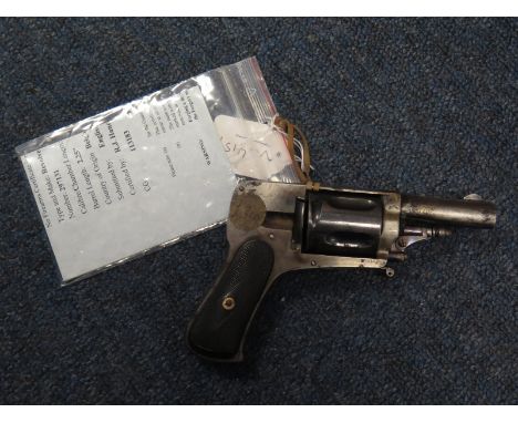 Revolver: An 8mm Lebel, Velo Dog chequered hard rubber grips. Folding trigger. Circa 1900. * Velo dog revolvers were made for