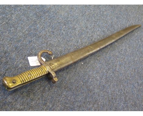 Bayonet: A model 1866 French Sabre bayonet ricasso marked 'P&H'. In its steel scabbard. Worn overall, slightly loose in scabb