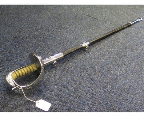 RAF QE2 officers sword with leather scabbard, nickel plated finish. Blade rusted