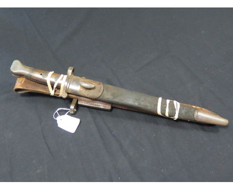 Bayonets: A good early MKI Ross rifle bayonet dated March 1915. In its MKI scabbard with integral frog and chape. Stamped 'MK