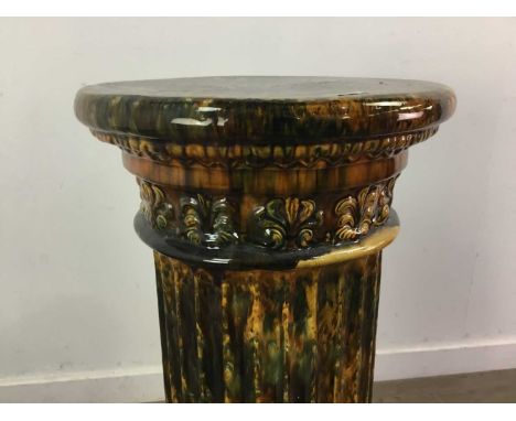 VICTORIAN DUNMORE POTTERY JARDINIERE STAND/PEDESTALin mottled glaze of earth tones with moulded detail, 81cm highThe top has 