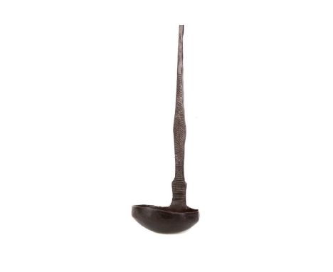 FOLK/PRIMITIVE WROUGHT IRON LADLE,19th century or earlier, the stem with engraved decoration, on hoop suspension, 28cm long