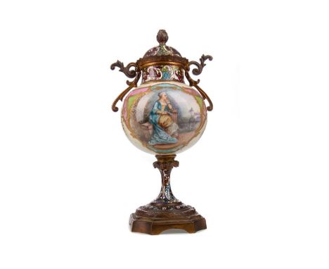 LATE 19TH CENTURY FRENCH PORCELAIN, GILT METAL AND CHAMPLEVE ENAMEL URN,painted with vignette of a lady in contemplative pose