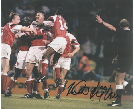Football Andy Linighan Arsenal signed 10x8 colour photo. Photo shows Linighan celebrating with his team mates. Good condition