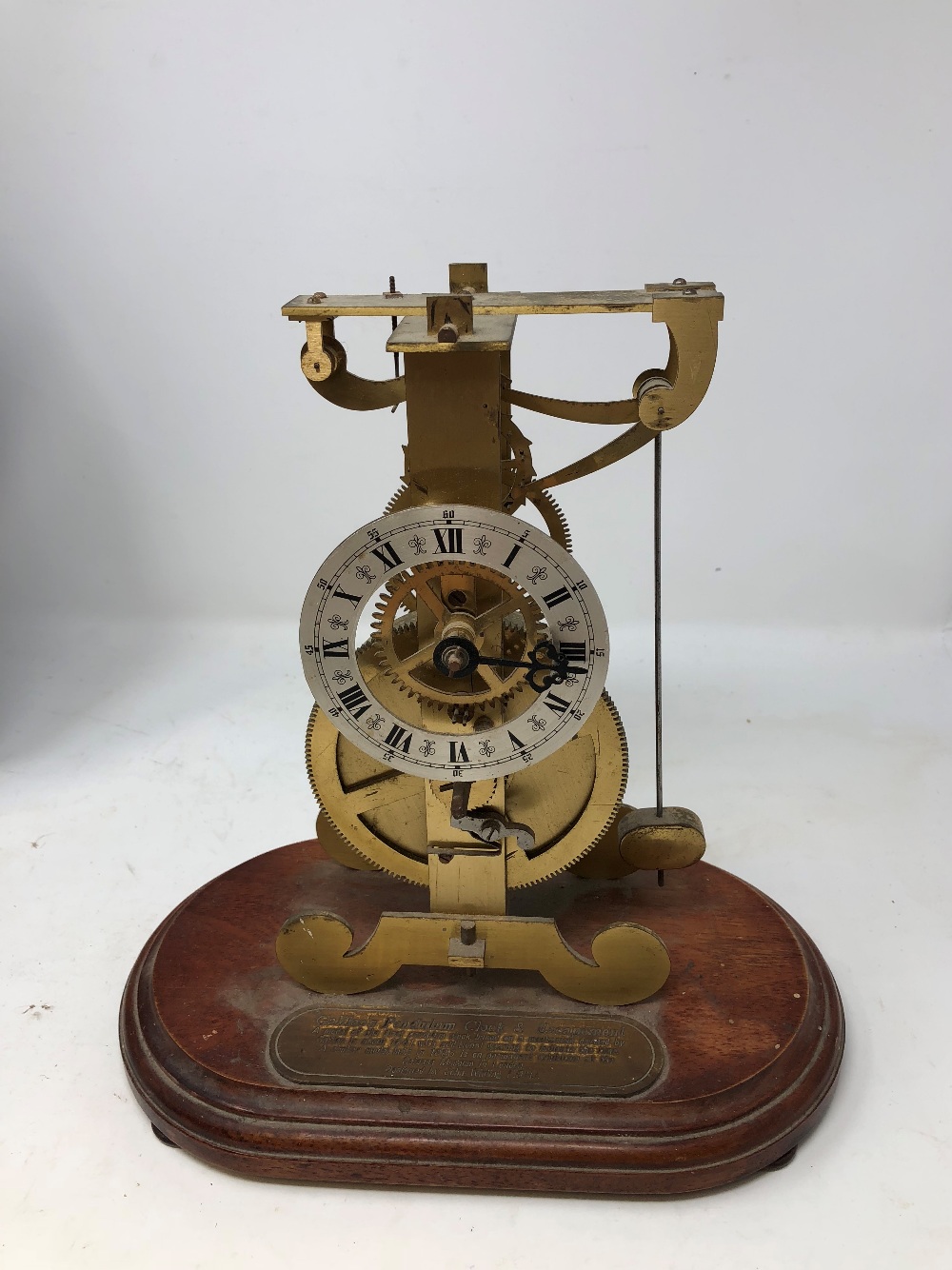 A model of Galileo's pendulum clock and escapement circa 1642. Mounted