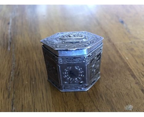 A German silver pill or snuff box with hinged lid. Marked 800 to the base.