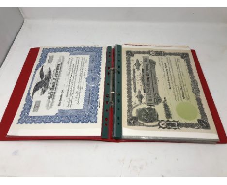 A folder of approximately 42 assorted share certificates including National Tea Co., Mississippi River Corporation, Magma Cop