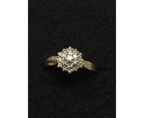 A 9ct gold diamond encrusted dress ring., Birmingham maker. Size N/O. Approximate total weight 2.6 grams.