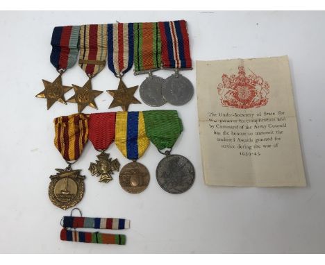 A WWII medal group of ten awarded to Corporal William Arthur Bassett of the Wiltshire Regiment. The medals are the 39/45 Star