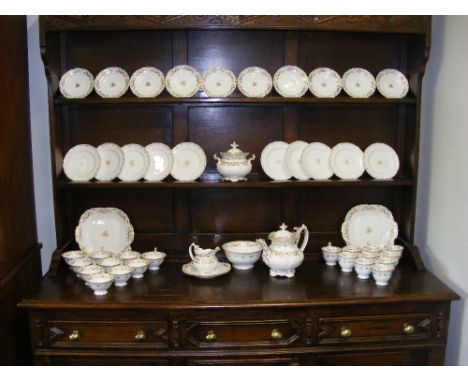 A mid 19th Century English ten setting tea/coffee set including an Adelaide shape Rococo dragon spout teapot. The set compris