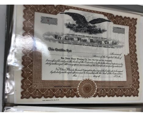 A folder of approximately 48 assorted share certificates, mostly mining including gold mines.