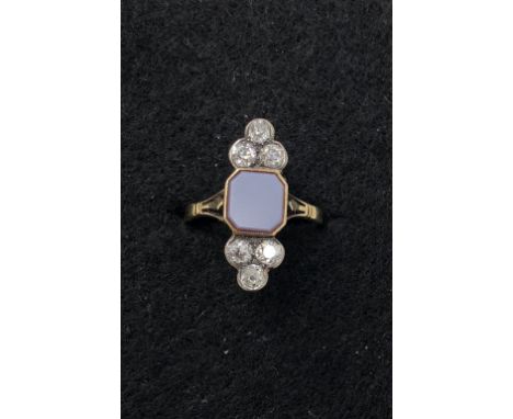  A fine 18ct gold Art Deco six stone old cut diamond ring with central carnelian, set in an elongated mount. Approximately 0.