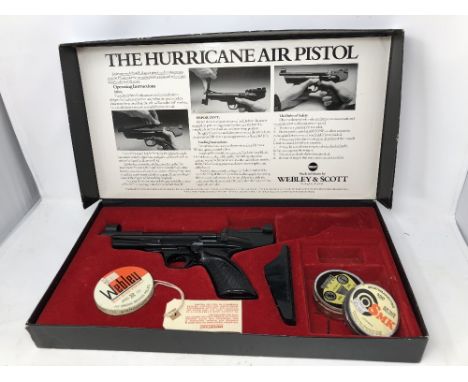 A boxed Webley and Scott Hurricane air pistol. With scope mount, instruction manual and pellets. Used but appears in very goo