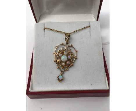 A 9ct gold and opal pendant necklace.