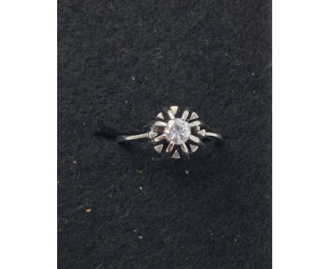 An 18ct white gold solitaire diamond ring of approximately 30 points. Size K, approximate weight 3.7 grams.