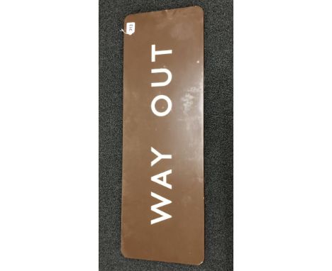 A 19th Century enamel "WAY OUT" railway station sign, brown with cream lettering. Clearly visible on the verso beneath the en