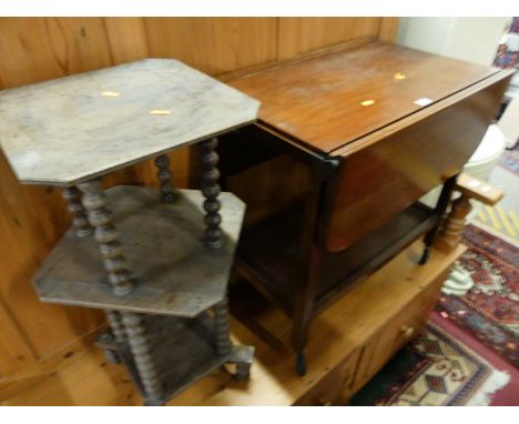 A 1930s walnut two-tier drop flap tea trolley, raised on roller castors, together with a circa 1900 walnut bobbin turned thre