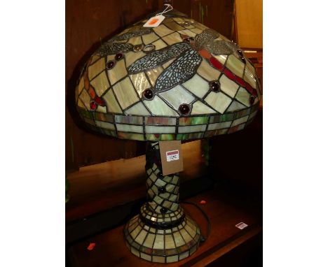 A Tiffany style coloured lead glass table lamp, having typical domed shade, h.60cm 