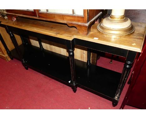 A contemporary oak and black painted breakfront two-tier console table, raised on turned and fluted supports, w.200cm 