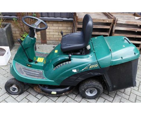 An Atco Rider 28H F72 Hydro petrol driven ride-on lawn mower, the engine by Briggs &amp; Stratton, with grass collecting box