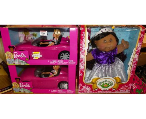 Two Barbie open top convertible cars, both housed in original boxes (as issued); together with a Cabbage Patch Kids 2014 limi