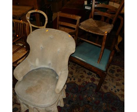 A collection of circa 1900 chairs to include; a Chippendale style mahogany elbow chair, width 69cm, three rush seat side chai